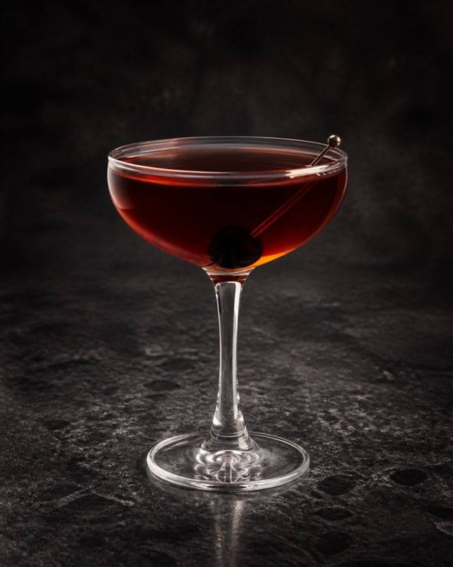 Black Manhattan cocktail illustration